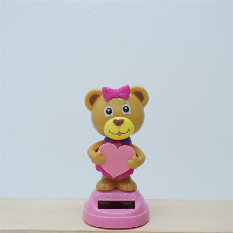 

Cartoon Love Bear Solar Toy Creative Funny Shaking Head Dancing Animal Bear Doll Solar Car Desktop Decoration Ornament Kids Gift