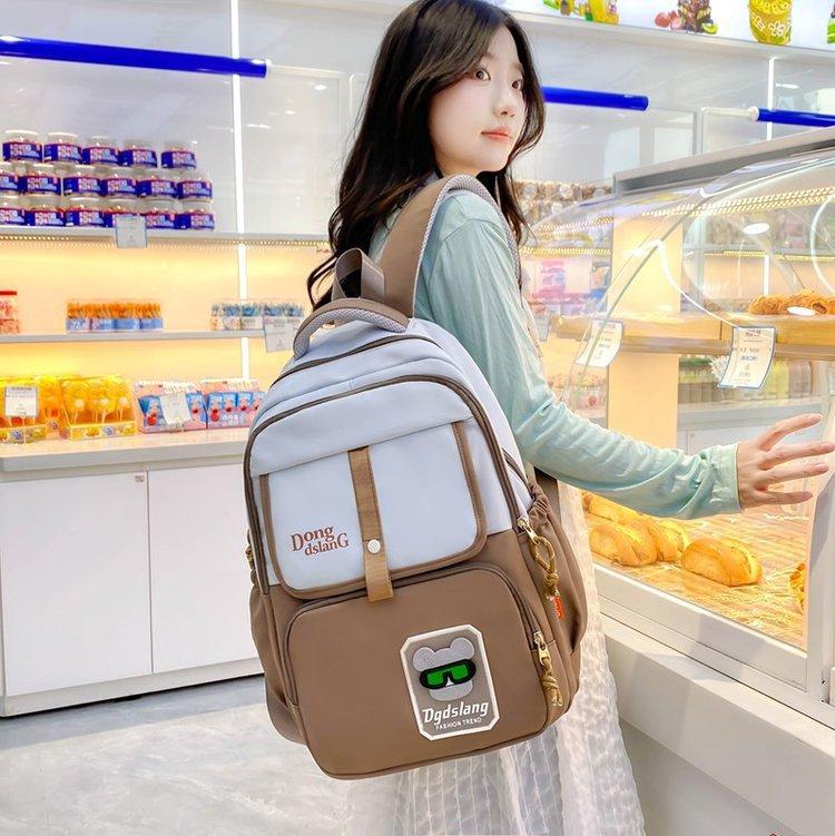 Schoolbag new Korean version ins lightweight load reduction wear-resistant versatile large-capacity schoolbag junior high school high school student