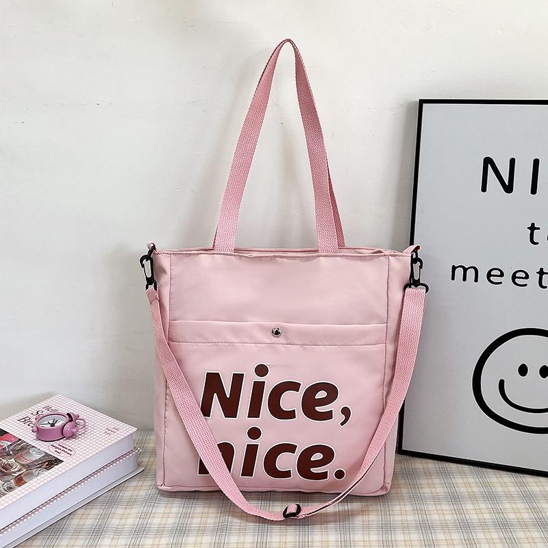 Stijlvolle studententote bag met grote capaciteit, nieuwe handtas met textuur, trendy schouder-okseltas.