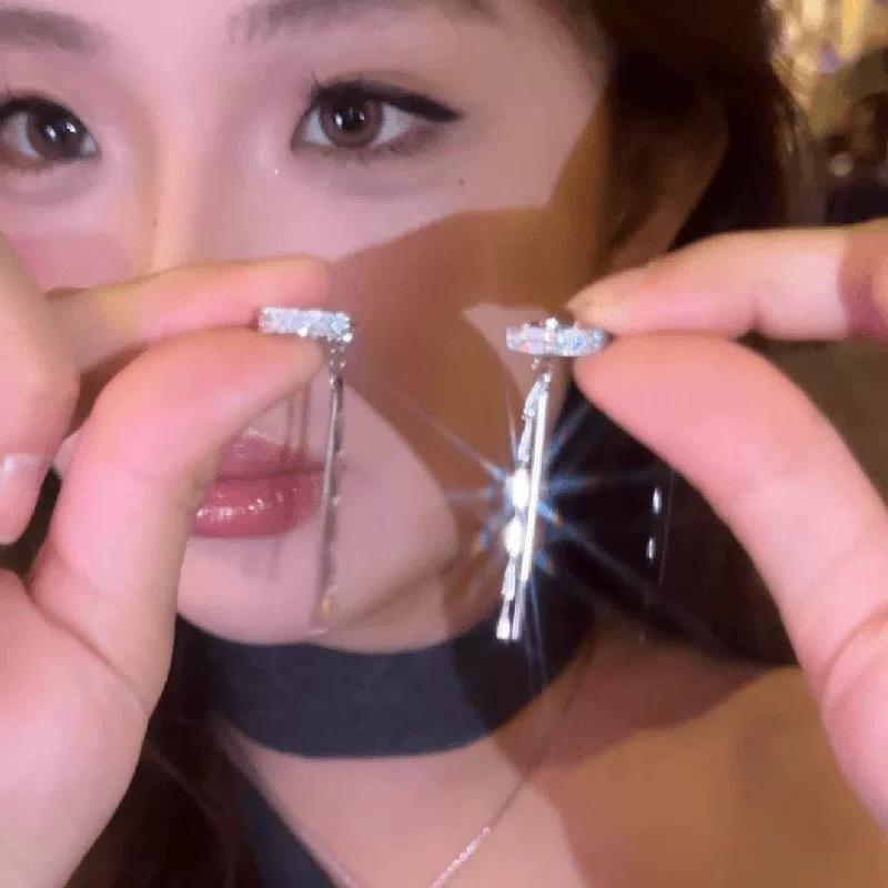 Элегантный серебряный клипс-серьга с кисточкой и сияющим цирконием для роскошной моды