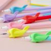 Couleur aléatoire en forme de poisson Aide à l'écriture ergonomique pour étudiants Grip Outil de correction de la posture Porte-grip d'entraînement en silicone pour crayons