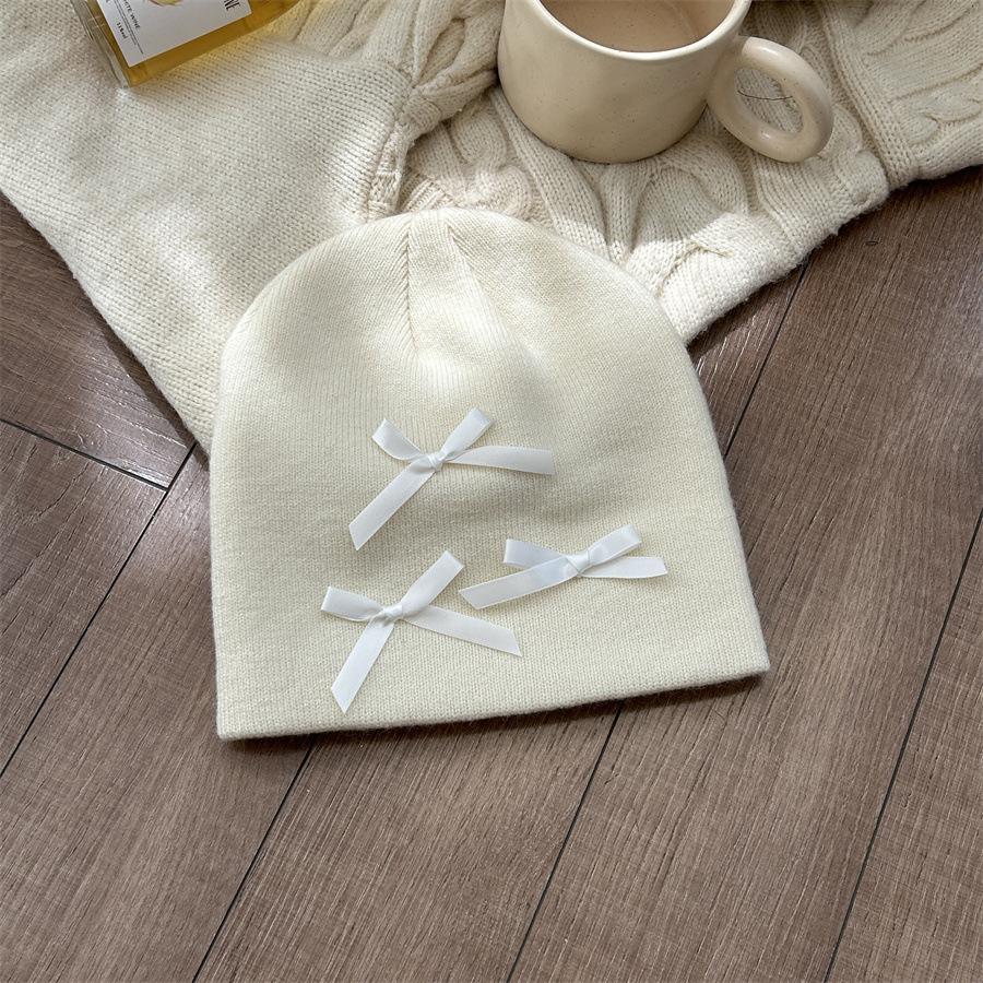 

Autumn and winter atmosphere ballet bow sweet cool hat knitted hat bag head black wool hat women One size is elastic (54-58cm) белый