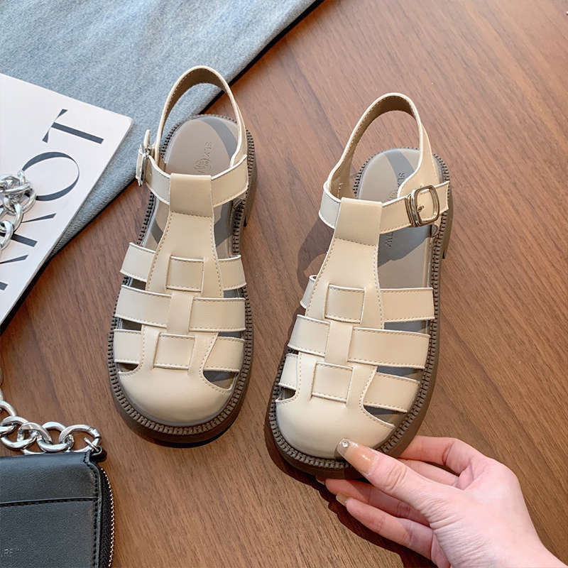 

Baotou sandals women s summer wear 2025 new models with skirts, thick-soled beach Roman shoes, fairy flat-soled pig cage single shoes 40