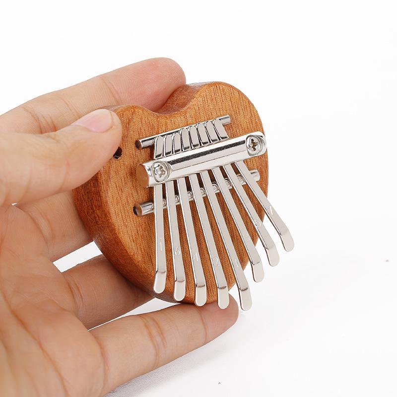 8-Tone Mini Finger Thumb Piano Kalimba Musical Pendant Gift