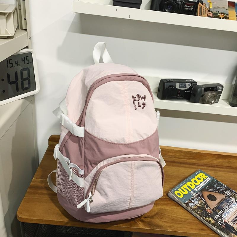 

Уличный досуг Джокер Легкий Большая вместимость Спортивный дизайн Студенческий школьный рюкзак Рюкзак для пешего туризма .