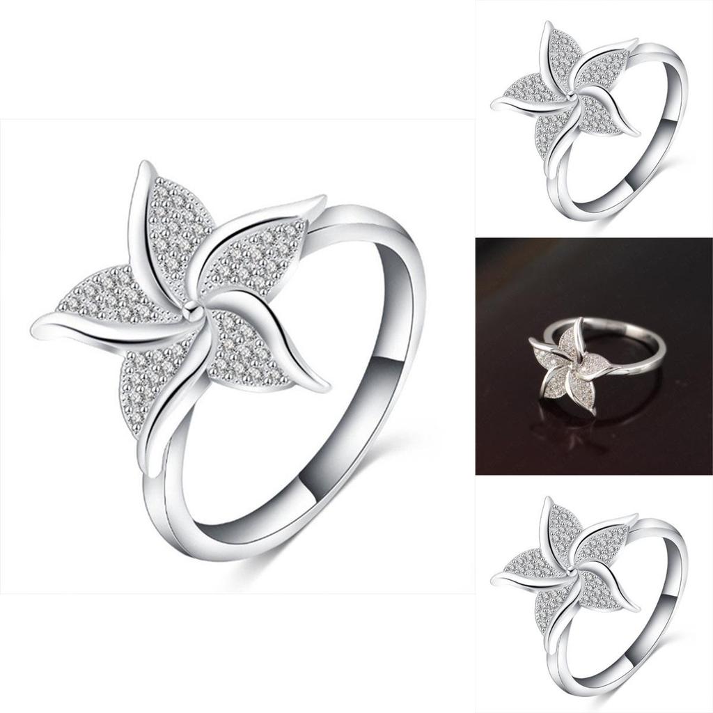 Stunning Fashion Windmill Shape Ring With Silver Plated Flower Design For Women