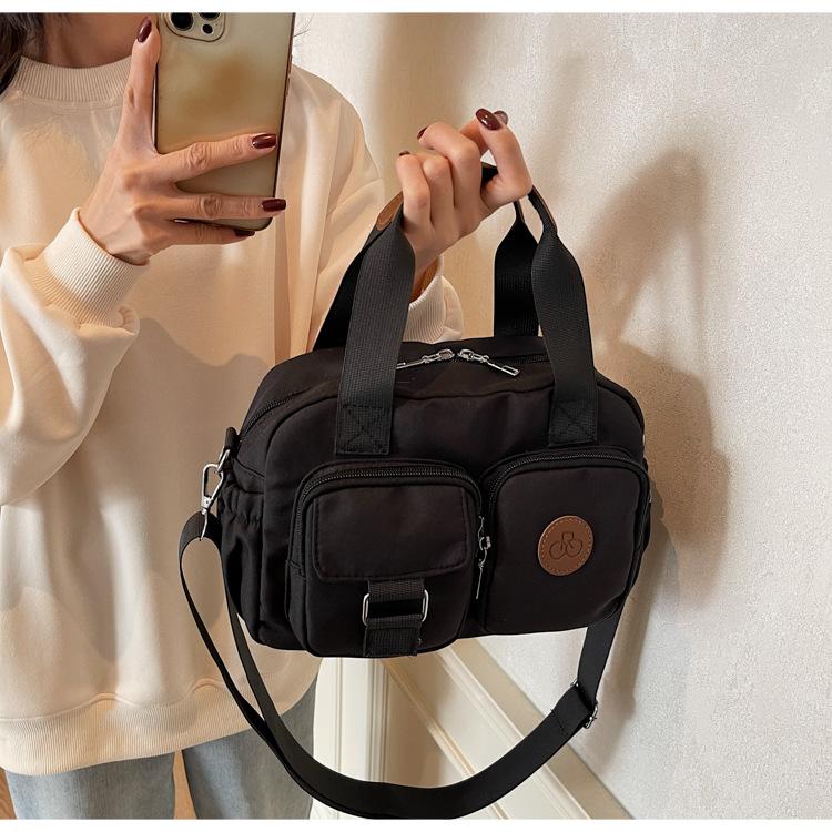 Multi-pocket retro casual handbag 2025 new nylon bag simple shoulder messenger bag