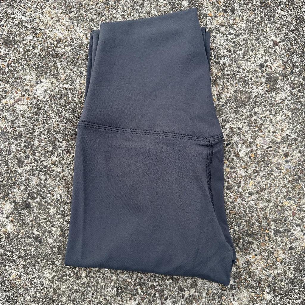 Solid Color High-Waisted Women's Yoga Leggings with Back Pocket – Soft, Elastic, and Peach Bum Enhancing