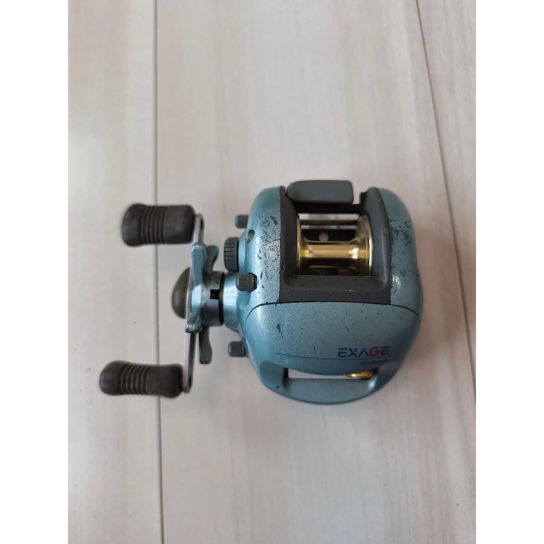 Used EXAGE bait reel