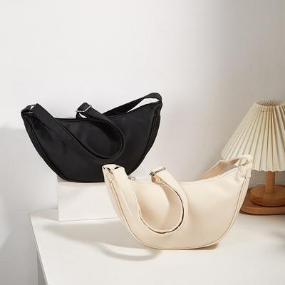 Nieuwe damestassen voor lente en zomer, high-end casual en eenvoudige dumplingtassen, modieuze en veelzijdige effen kleur schoudertassen