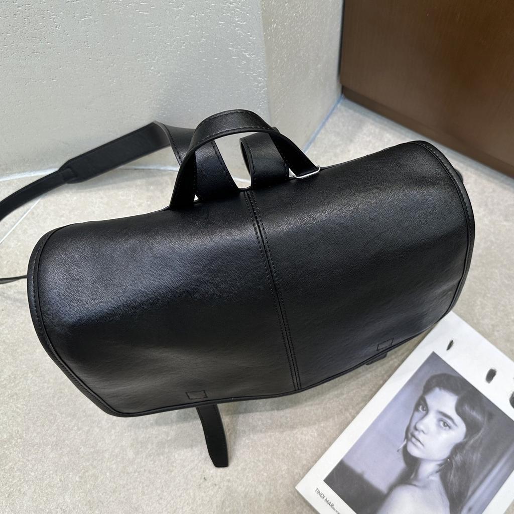 The first layer of vegetable tanned cowhide messenger retro backpack 2025 new large-capacity casual simple work commuter bag