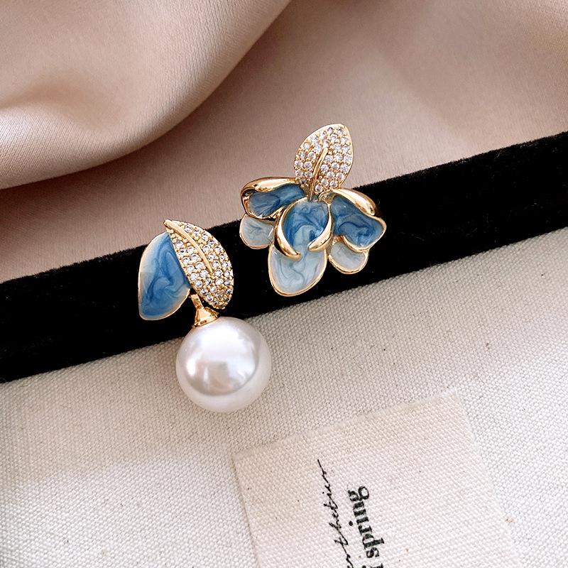 Real gold electroplated zircon pearl dripping oil flower earrings women s simple stud earrings niche