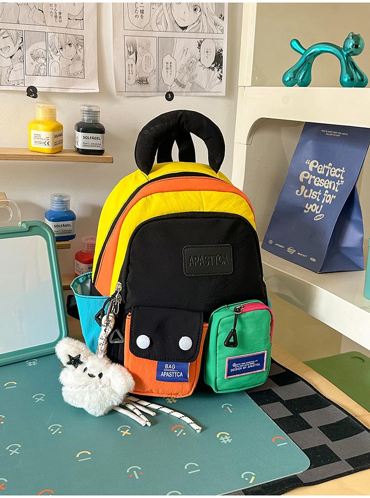 Schoolbag vitality rainbow color matching splicing backpack girl childlike dopamine wind shopping photo clock in backpack
