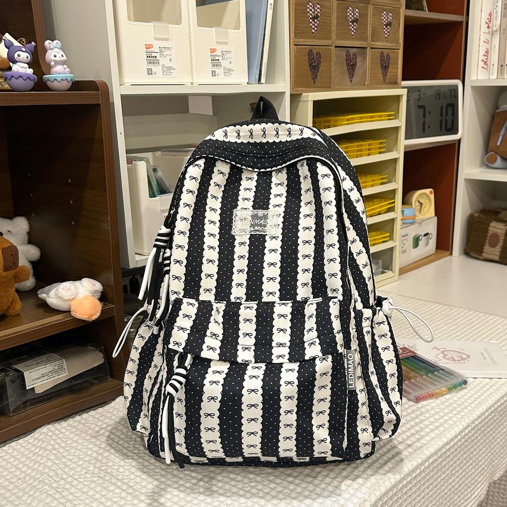 Schoolbag new sweet and cute backpack girls lightweight junior high school student schoolbag striped bow high value backpack