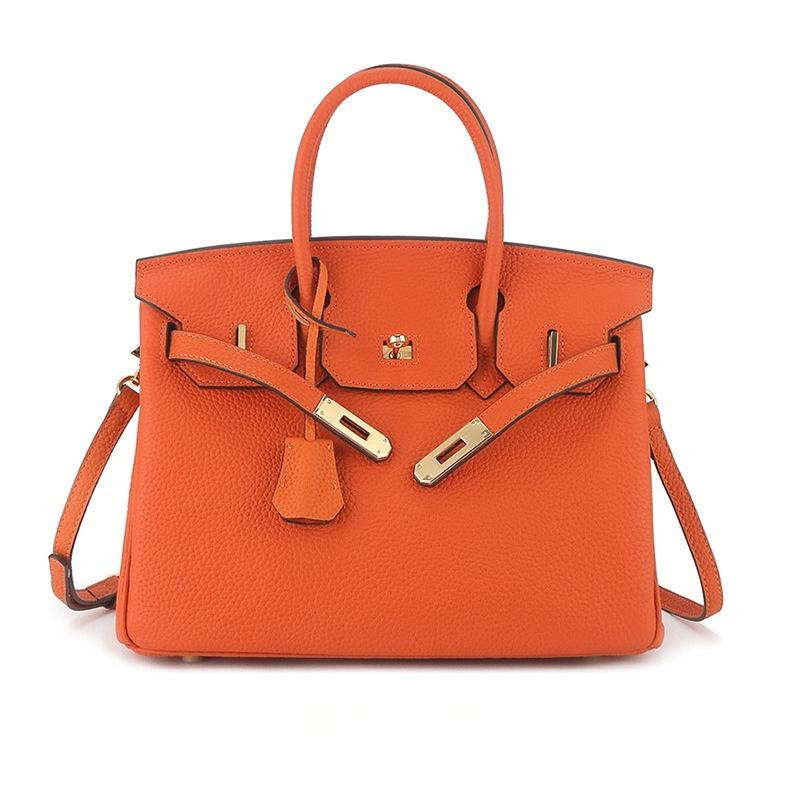 Erste Schicht togo Rindsleder große Kapazität Leder Litschi-Muster Damenmode Schloss Handtasche 20x10x15cm orange