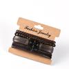 4-Piece DIY Weaving Bracelet Set: Fashionable Black & Brown Ship Wheel Cowhide Bracelets for Men & Women, Retro Style Jewelry.