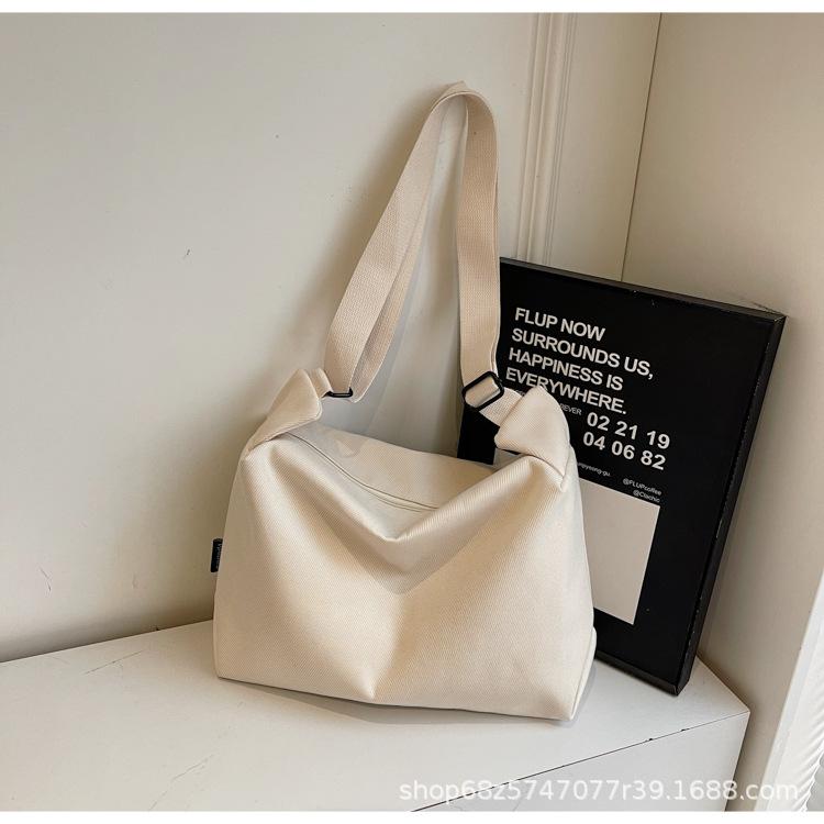 2025 New Canvas Casual Large Capacity Commuter Bag Women's One Shoulder Crossbody Bag Women's Bag Fashionable Versatile Tote Bag