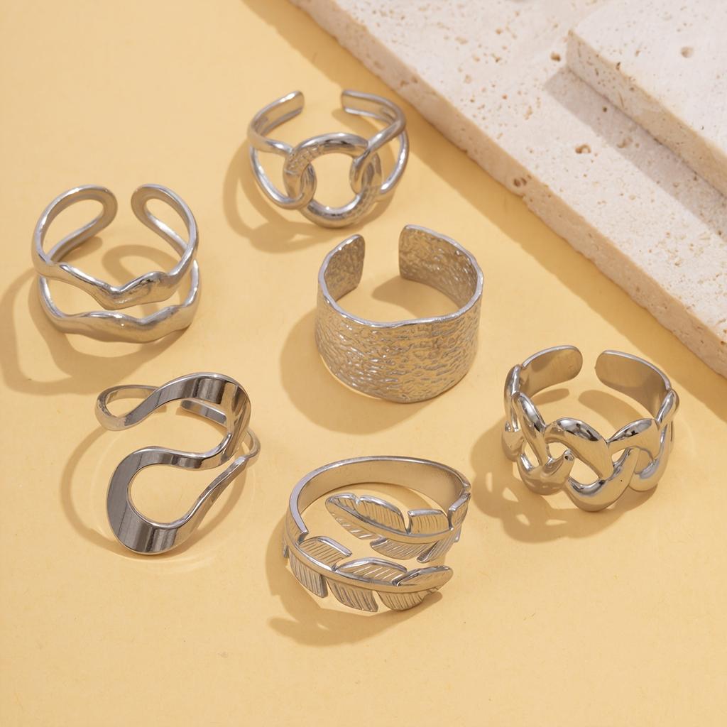 Fashionable stainless steel ring with a simple hollow geometric design, suitable for stacking, a versatile choice for casual wear