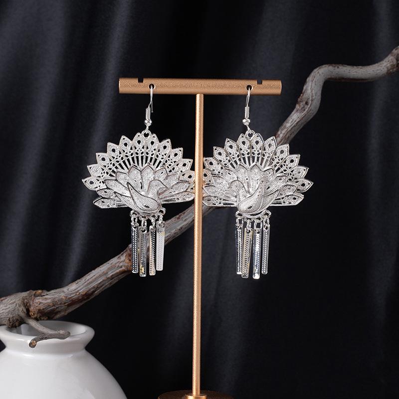Bohemian Ethnic Miao Silver Tassel Earrings with Butterfly, Peacock, and Flower Design for Women – Long Dangle Jewelry for Travel Photos.