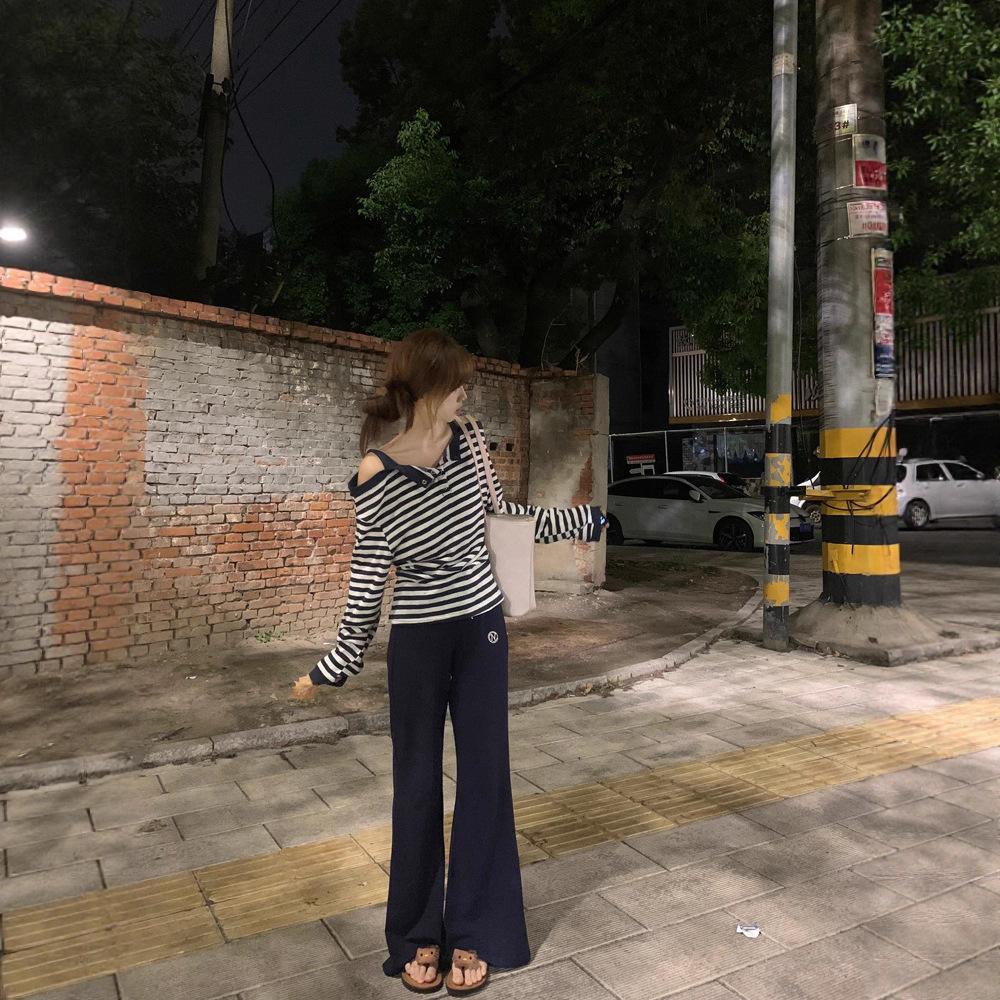 Korean striped fake two-piece one-word shoulder long-sleeved t-shirt women's autumn 2026 new loose lazy sweet hottie top
