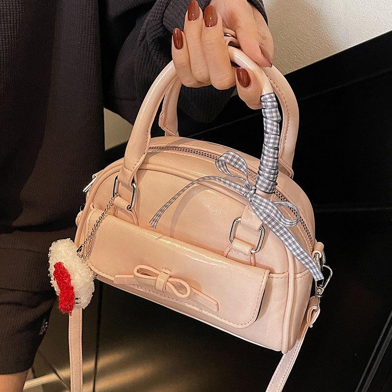 South Korea's Popular Simple Niche Portable Bowling Bag High-end Texture Ballet Style Commuter Versatile Messenger Bag Women