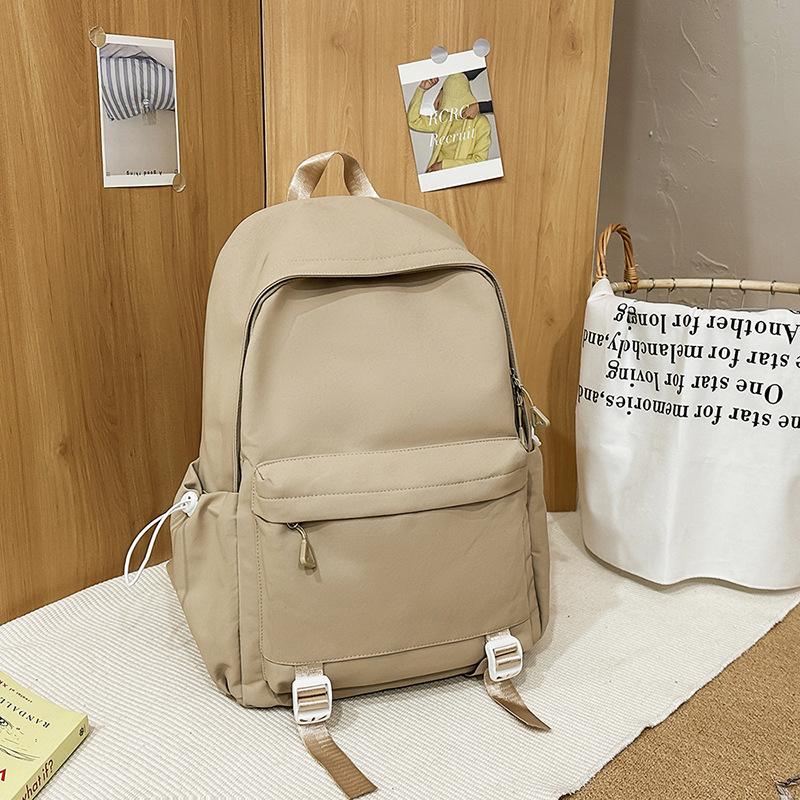 Schoolbag1011 new versatile black schoolbag male college student large capacity backpack female junior high school girl solid color backpack
