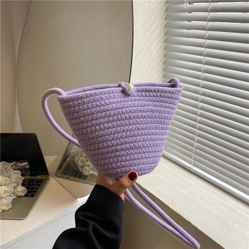 

Woven bag women s 2025 spring and summer new trendy fashion Internet celebrity beach straw bag ins versatile messenger bucket bag фиолетовый