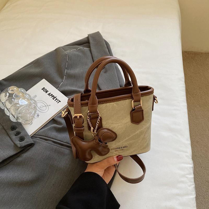 Textur trendige Nischentasche Herbst neu retro Schulter Umhängetasche Mode tragbare Eimertasche Damen