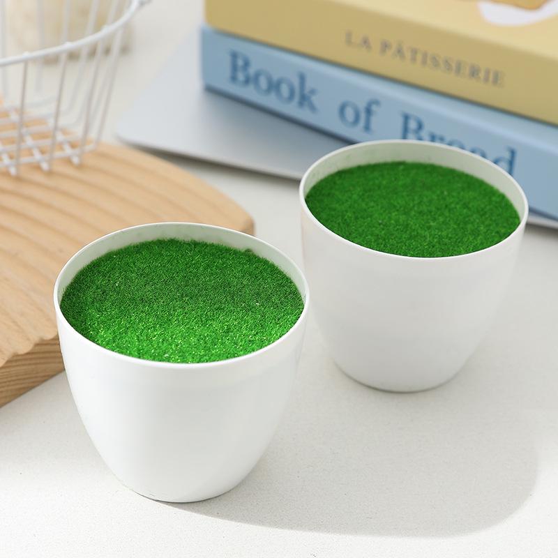 Simulated plastic pots for artificial flowers or succulents, perfect for table display.