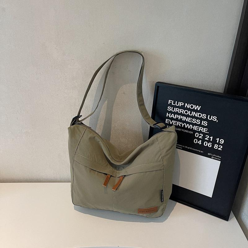 Canvas bag women's large-capacity new versatile shoulder messenger bag cloth bag class commuter tote bag