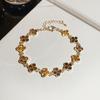 Rhinestone Clover Flower Bracelet: Elegant Retro Design with a Light, Luxurious Touch