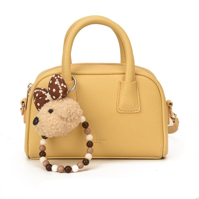 

Han niche fashion portable Boston bag women s 2026 spring new light luxury shoulder messenger bag without pendant жовтий