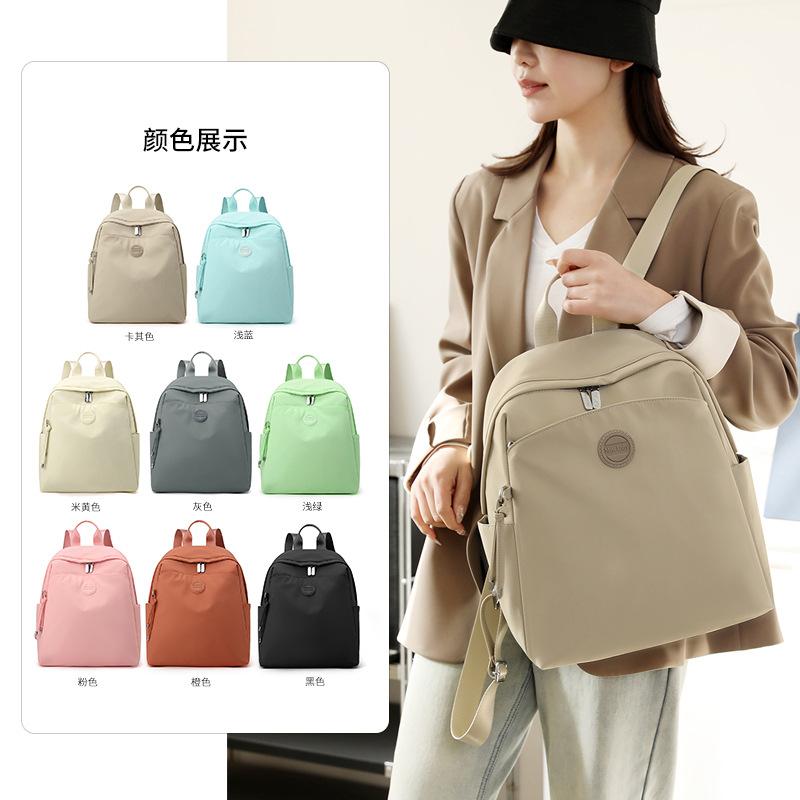 Schoolbag New Backpack Women's Oxford Cloth Anti-splashing Travel Backpack Premium Sense Large Capacity Fashion Lightweight Commuter Backpack