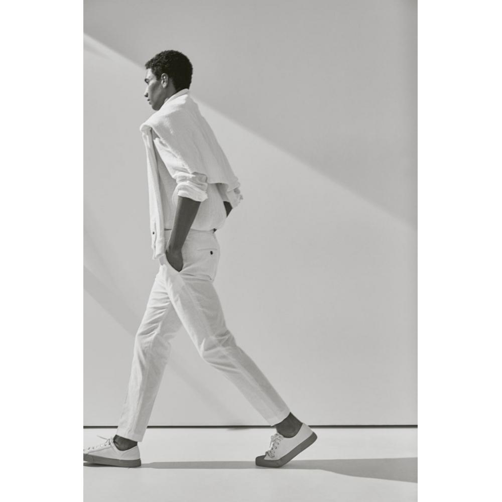 

Брюки узкого кроя из смесового льна HM, белые