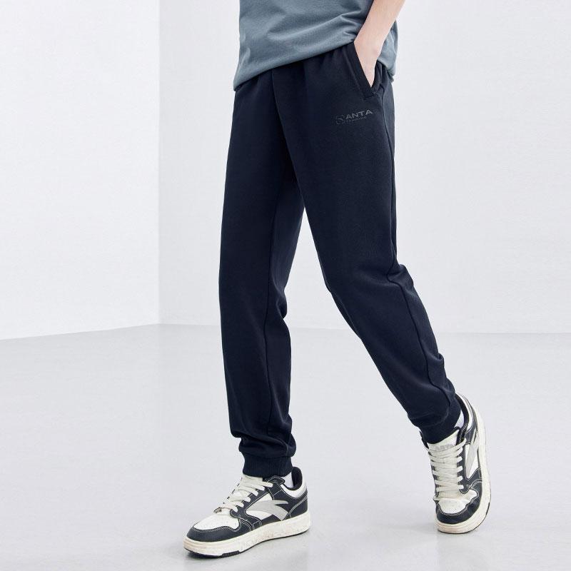 Anta Training Series Solid Color Elastic Waist Tapered Knit Sports Pants Men Pants Black 952357303-1
