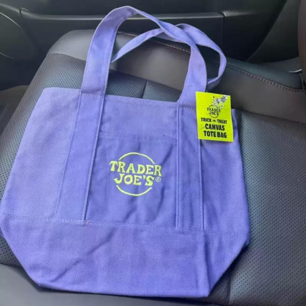 Official Trader Joe's Trick or Treat Tote Bag - Purple Reusable Canvas Bag for Groceries Cycling Errands Cafe Outings