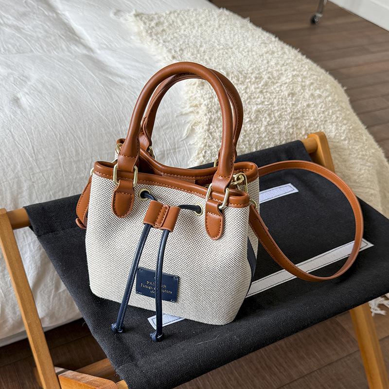 

Fashion hand-carried woven bucket bag women s summer simple shoulder bag trendy niche high-end messenger bag тёмно-синий