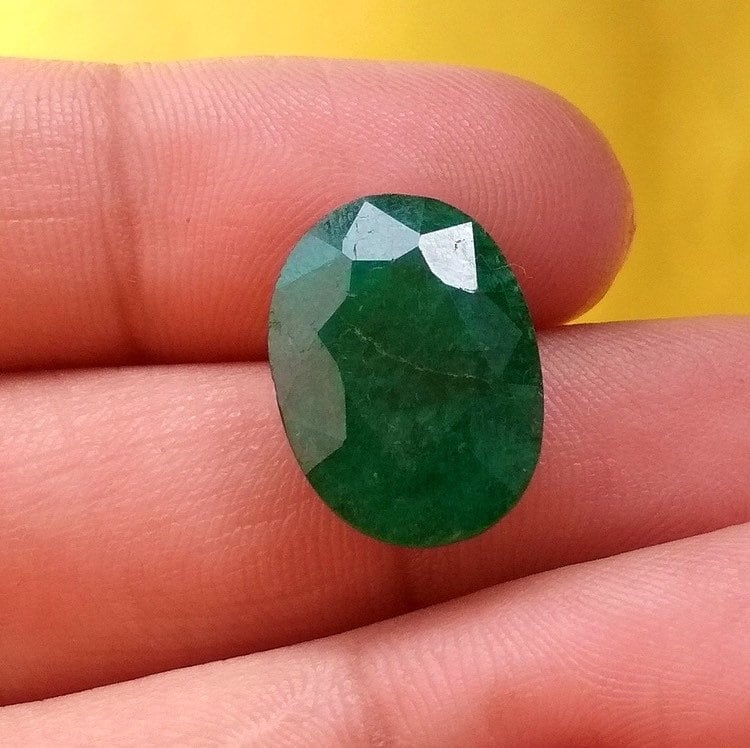 Zambian Emerald: Faceted Oval Loose Gemstone for Jewelry 14.5x13x8 MM