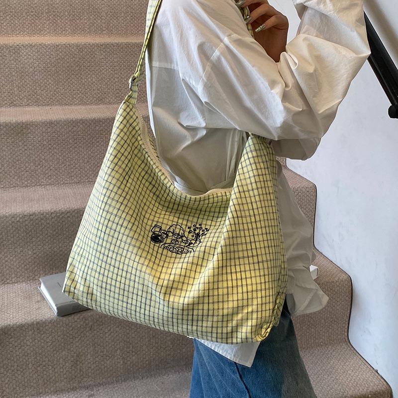Simple canvas bucket bag women's spring and summer new fashionable versatile plaid large-capacity shoulder bag