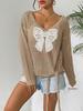 Women's Loose-Fit Knitted Sweater with Butterfly Tie-Up and Hollow-Out Sleeves