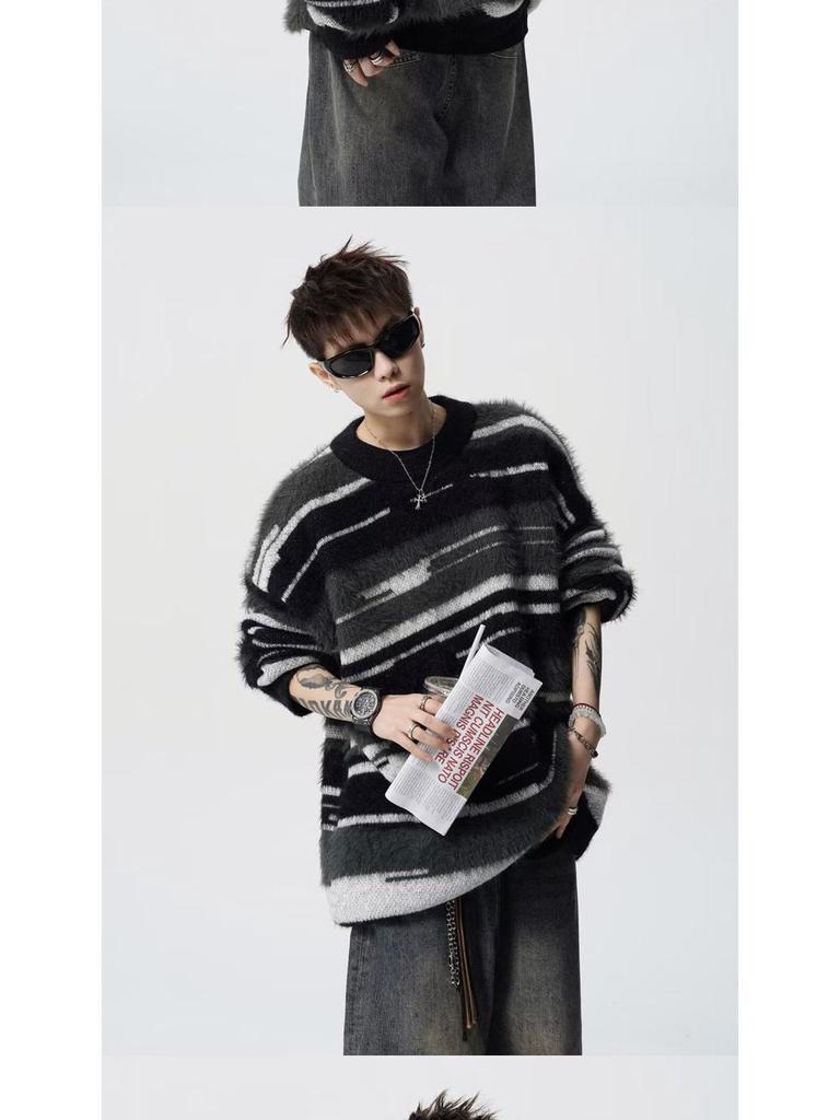 Herrhöstens/vinterns färgrandiga löst stickade tröja