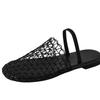 Niche Design Hollow Woven Fishing Net Surface Flat Bottom One Word Sandals Women Wear Sandals Wear Half Slippers Women