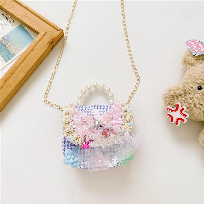 Stilvoller Prinzessinnen-Rucksack für Mädchen, verziert mit Perlen und Cartoon-Mustern in lebendigen Farben