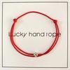 Red String Lucky Clover Bracelet - Woven Hand Rope for Couples, Besties, Students; Symbol of Peace and Harmony.