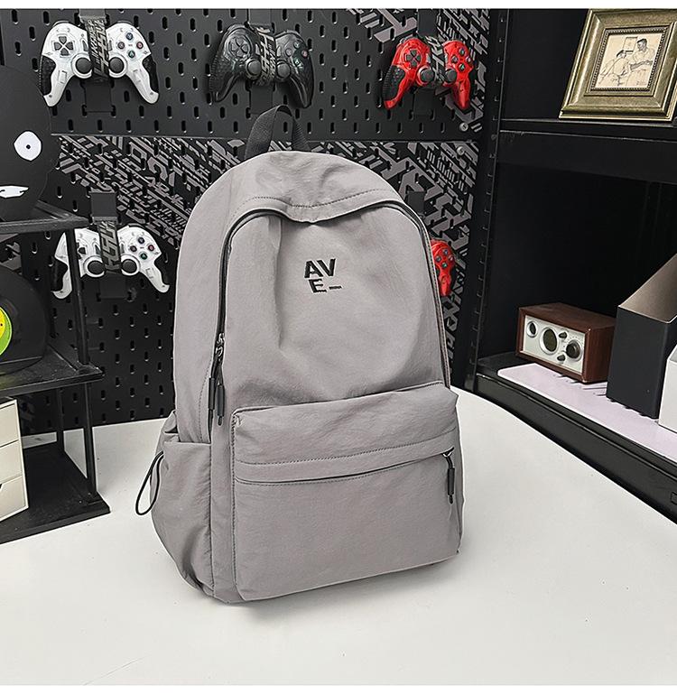 School bag Korean version couple simple large-capacity backpack leisure commuting college student school bag niche light travel backpack