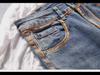 Leichte Luxus-Slim-Fit-Jeans im koreanischen Stil für Herren mit Farbdruck – trendige Freizeithose mit dünnem Design.
