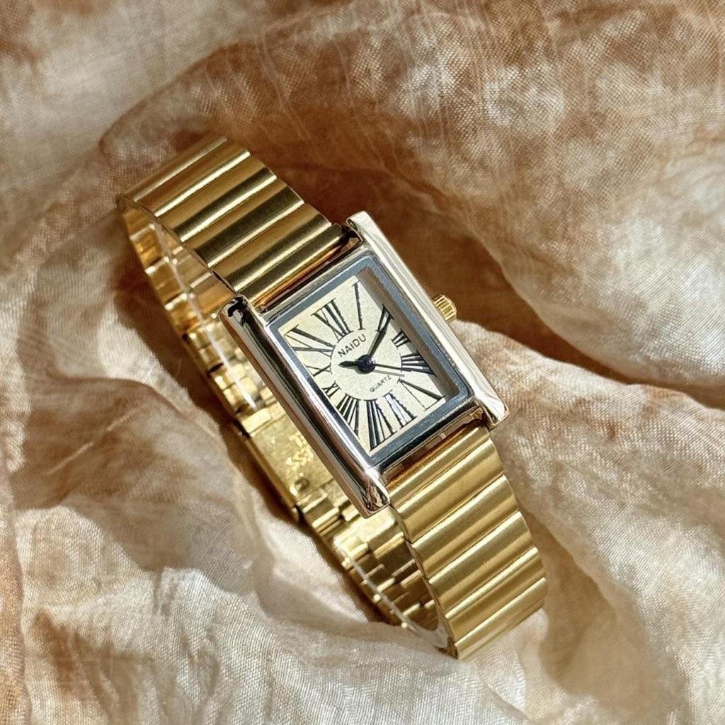 Women's Luxury Quartz Watch with Roman Numerals, Square Face, Bamboo-Style Steel Band, Niche Design.
