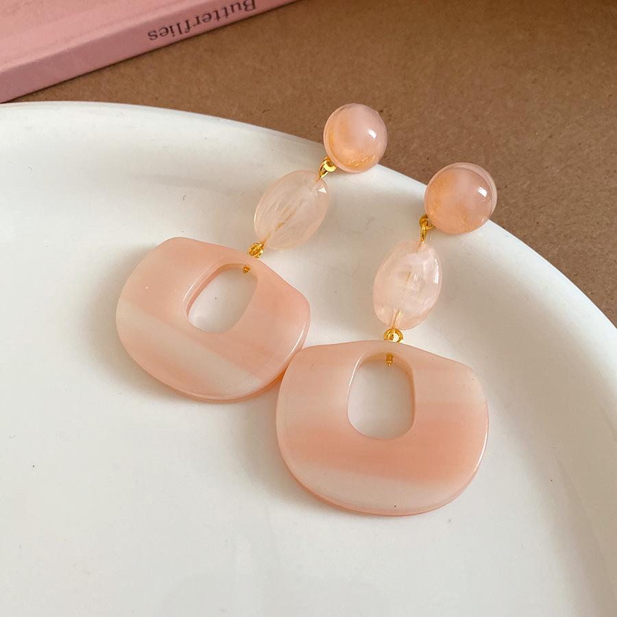 

Silver needle resin oval pendant earrings light luxury high-end stud earrings fashion simple personality temperament earrings