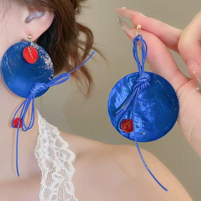 Light Luxury Flower Pattern Tassel Earrings: Niche Design with High-End Versatile Appeal