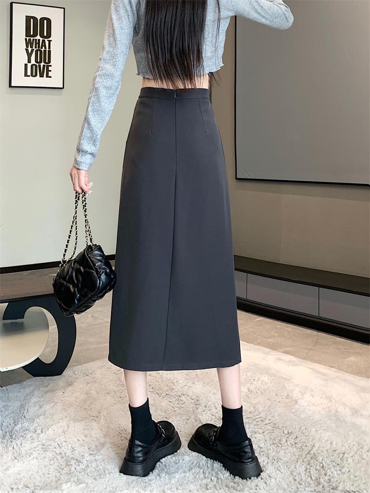 Dámská midi sukně áčkového střihu s vysokým pasem a rozparkem pro raný podzim 2025